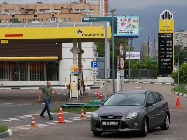 a car stops at a gas station in Russia