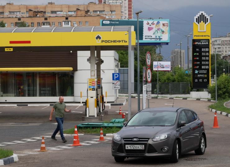 a car stops at a gas station in Russia