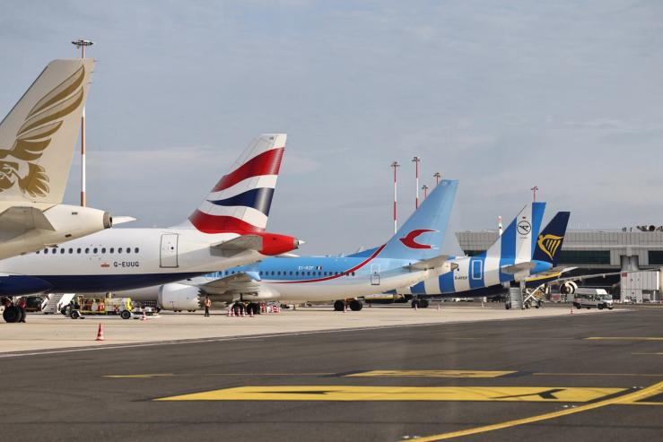Aircrafts are parked on the tarmac at Rome’s Fiumicino airport.