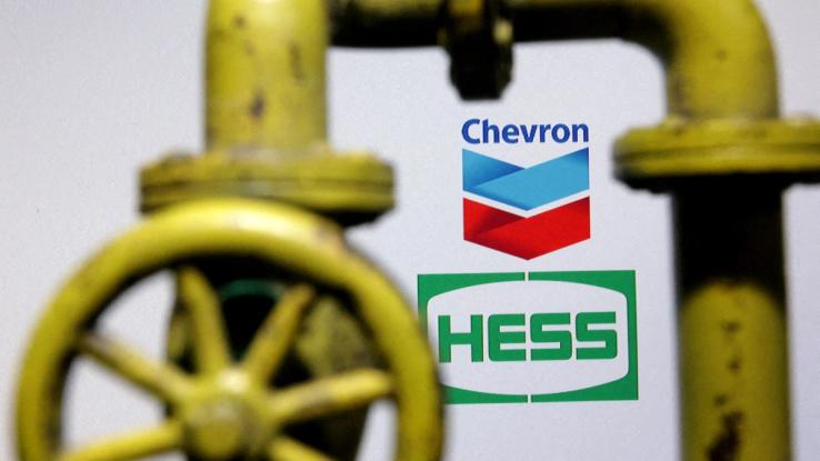 Chevron and Hess logos are seen in this illustration taken