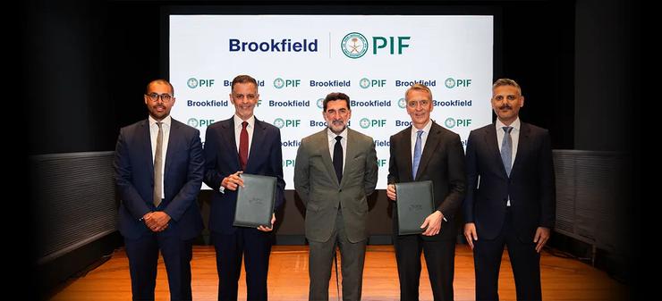 PIF Governor Yasir Al Rumayyan, center, with Brookfield CEO Bruce Flatt, second from right, at signing ceremony.
