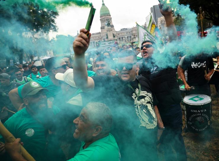 Members of the Argentine Central Workers Union demonstrate as they join the weekly protest of retirees to support their demands for improved income, a day before a general strike against Argentinian President Javier Milei’s adjustment policies and the IMF loan deal, outside the National Congress, in Buenos Aires, Argentina April 9, 2025.