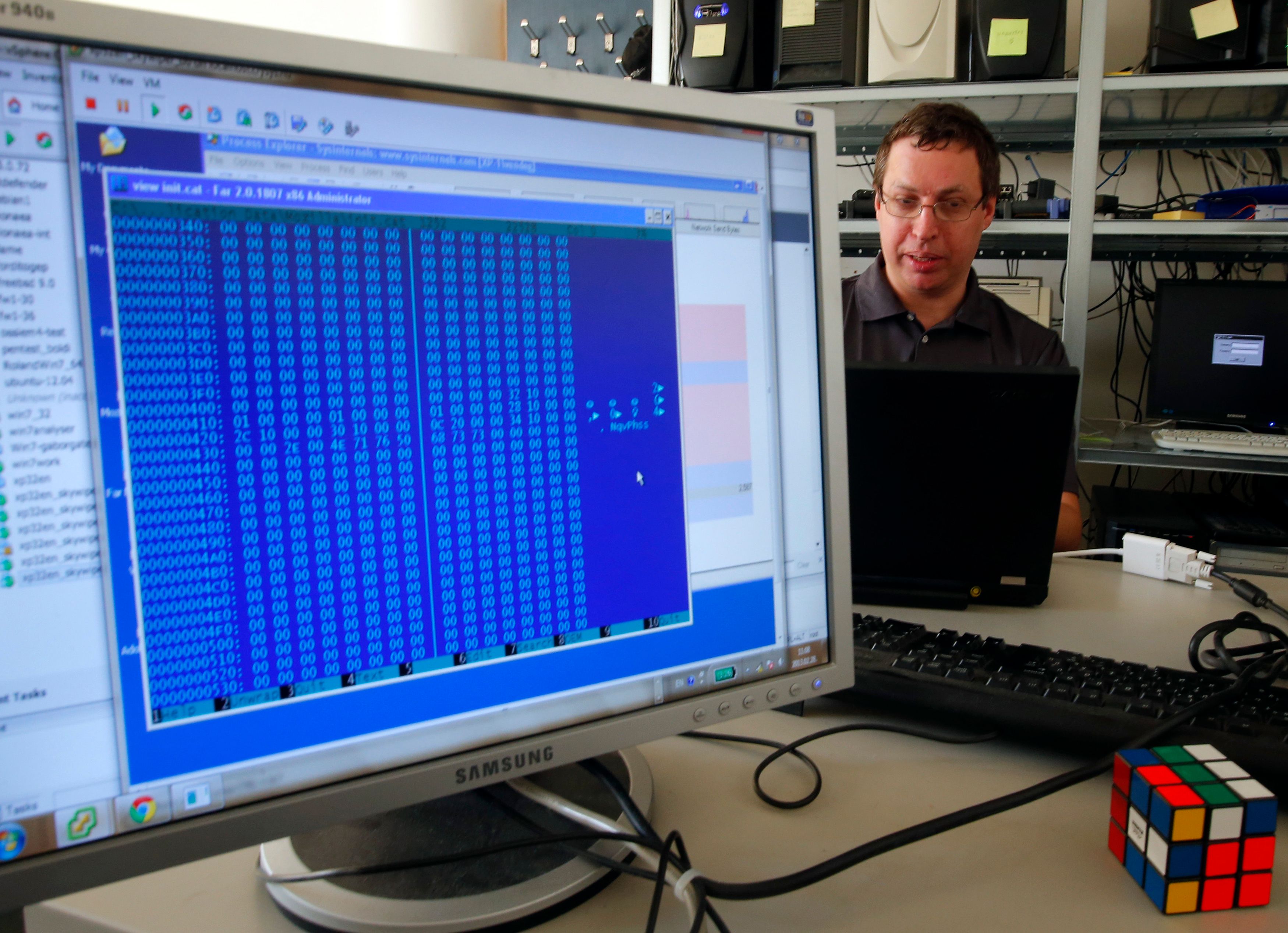 Boldizsar Bencsath from Hungary’s Laboratory of Cryptography and System Security, or CrySyS, works at his computer at the Budapest Technical University February 28, 2013. 