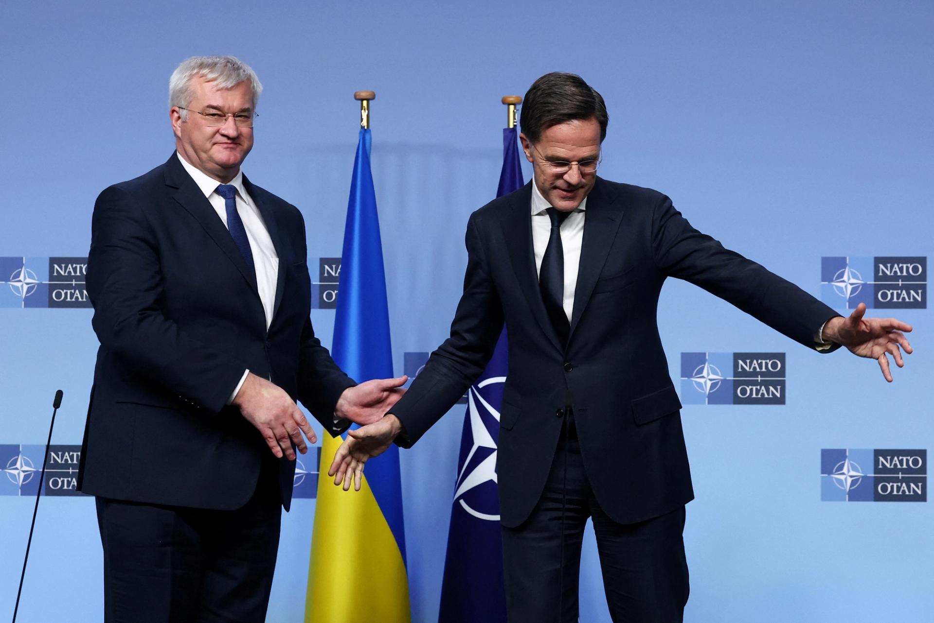 Ukrainian Foreign Minister Andrii Sybiha and NATO Secretary General Mark Rutte attend a NATO foreign ministers’ meeting at the alliance’s headquarters in Brussels, Belgium December 3, 2024.