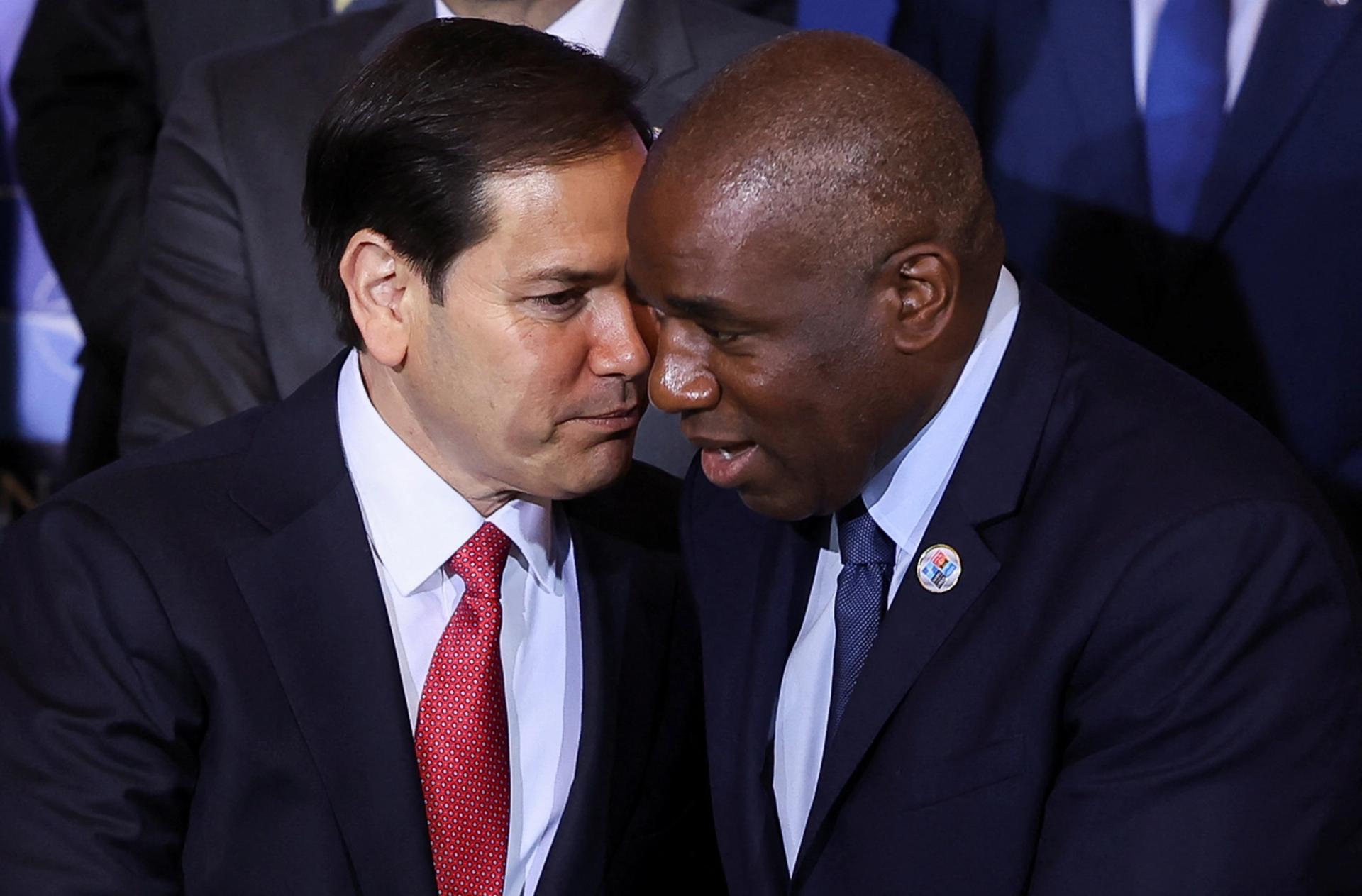 US Secretary of State Marco Rubio speaks with British Foreign Secretary David Lammy.