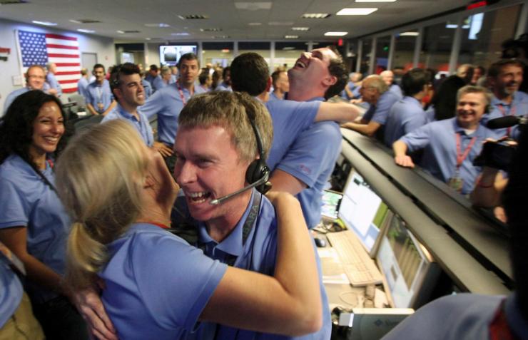 Engineers celebrate Mars rover landing.