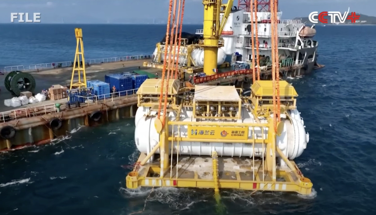 Underwater data center is lowered into the ocean off China.