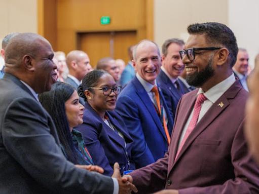 African Export-Import Bank President Benedict Oramah (left) and Guyana President Mohamed Irfaan Ali.