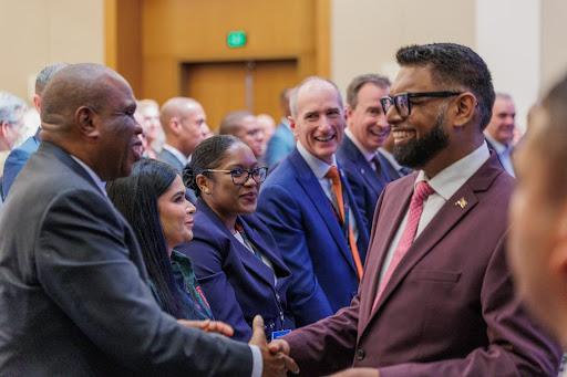African Export-Import Bank President Benedict Oramah (left) and Guyana President Mohamed Irfaan Ali.