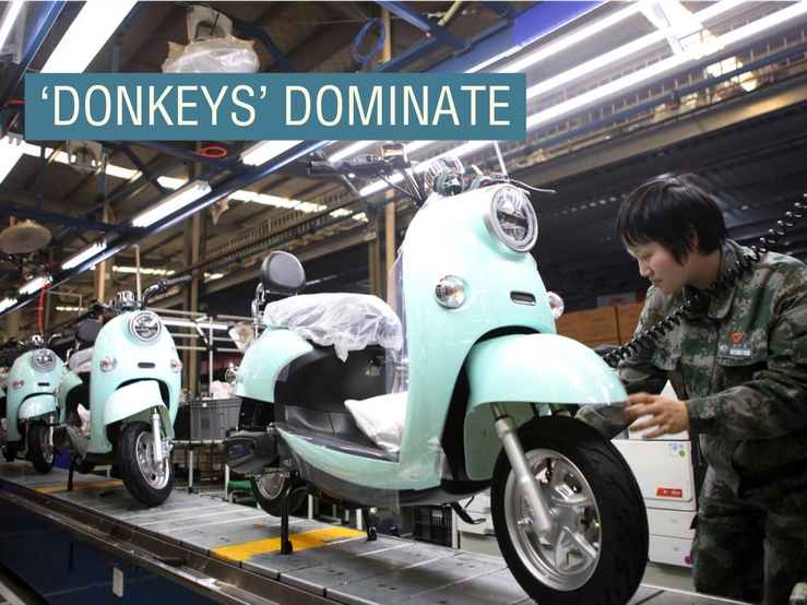 Photo shows local workers are busy assembling and testing motobikes at the workshop of Yadea, a large manufacturer of electric two-wheel vehicles