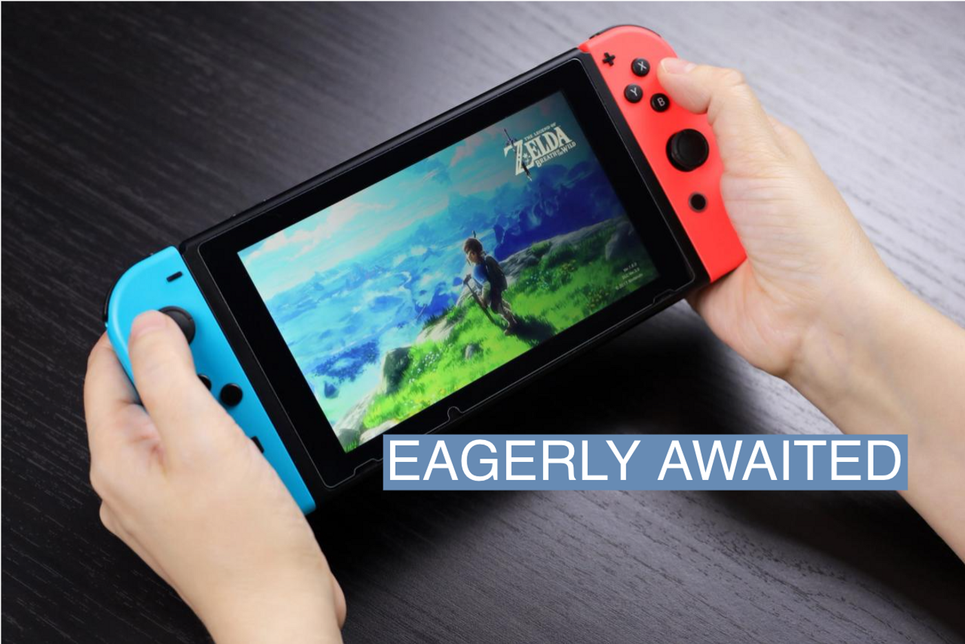 rl playing The Legend of Zelda game on Nintendo Switch console in handheld mode, selective focus on a screen.