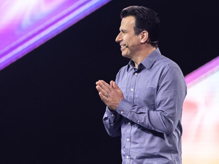 Andrew Anagnost speaking at an event.