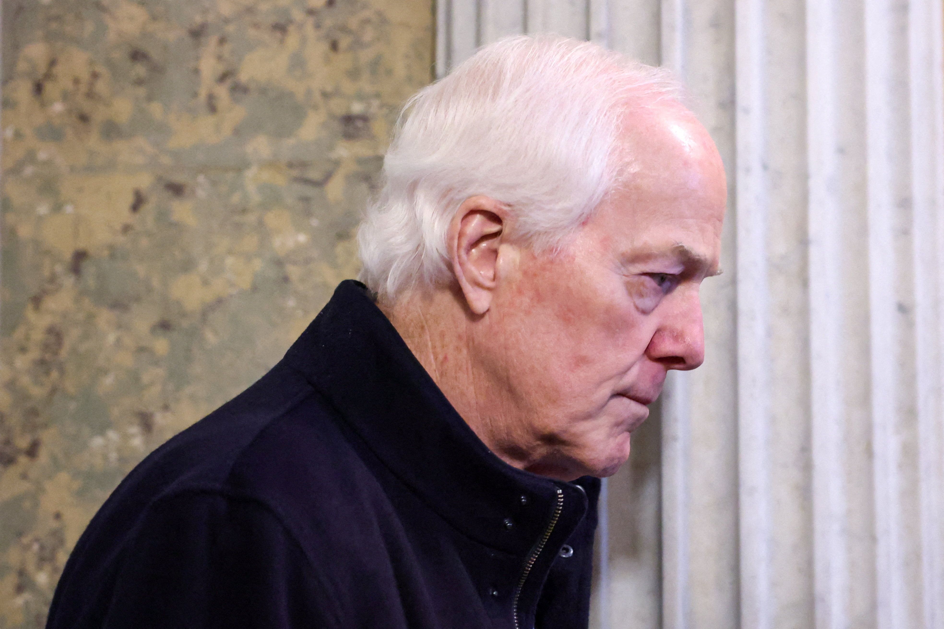 U.S. Senator John Cornyn (R-TX) departs following a vote in the U.S. Senate on a bipartisan war powers resolution aiming to stop the military campaign against Iran, on Capitol Hill in Washington, D.C., U.S.