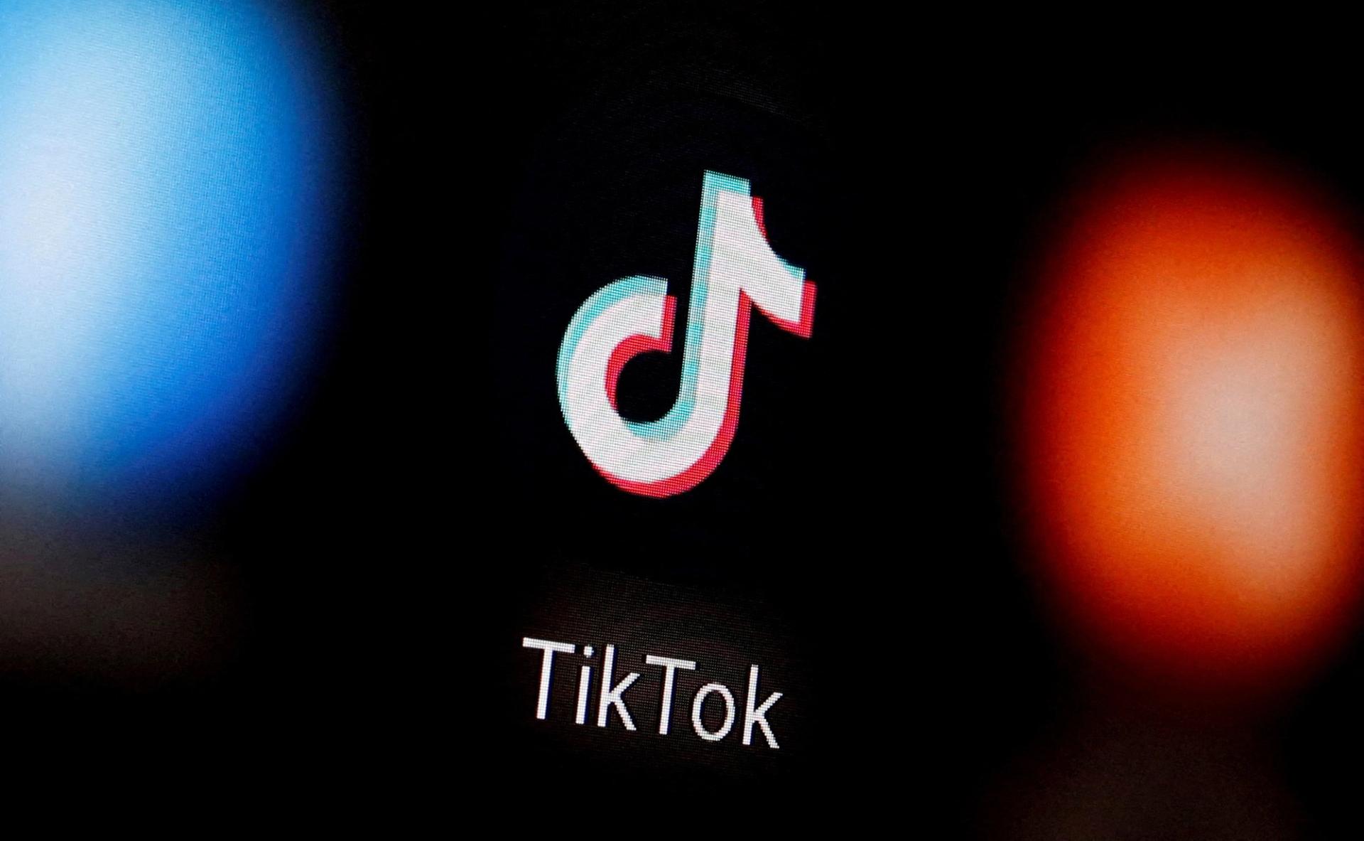 The TikTok logo against a dark background.