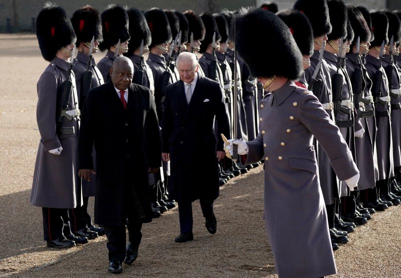 President Cyril Ramaphosa, of South Africa, walks with King Charles III as they inspect a Guard of Honour during the ceremonial welcome for his State Visit to the UK at Horse Guards Parade in London.