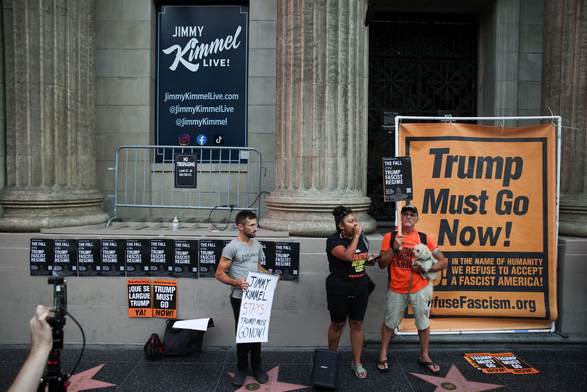 Protesters demonstrate outside Jimmy Kimmel’s studio.