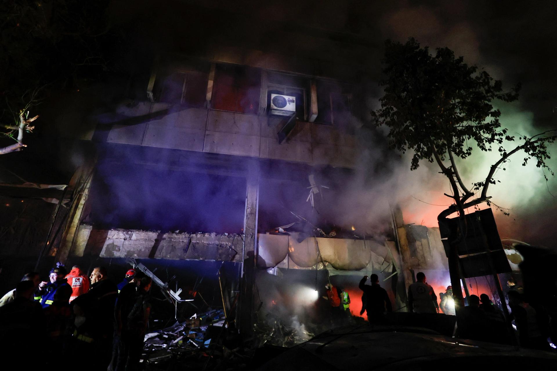 The aftermath of Israeli air strikes on central Beirut on Sunday.