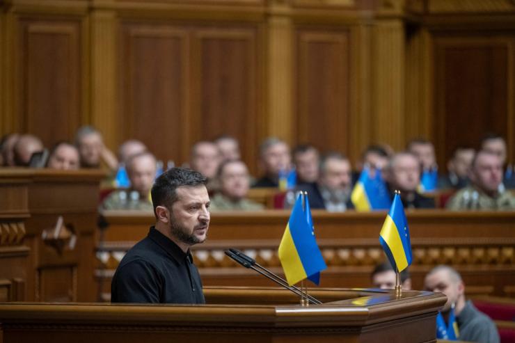 Volodymyr Zelenskyy, wearing a dark polo shirt, addresses Ukraine’s Parliament.