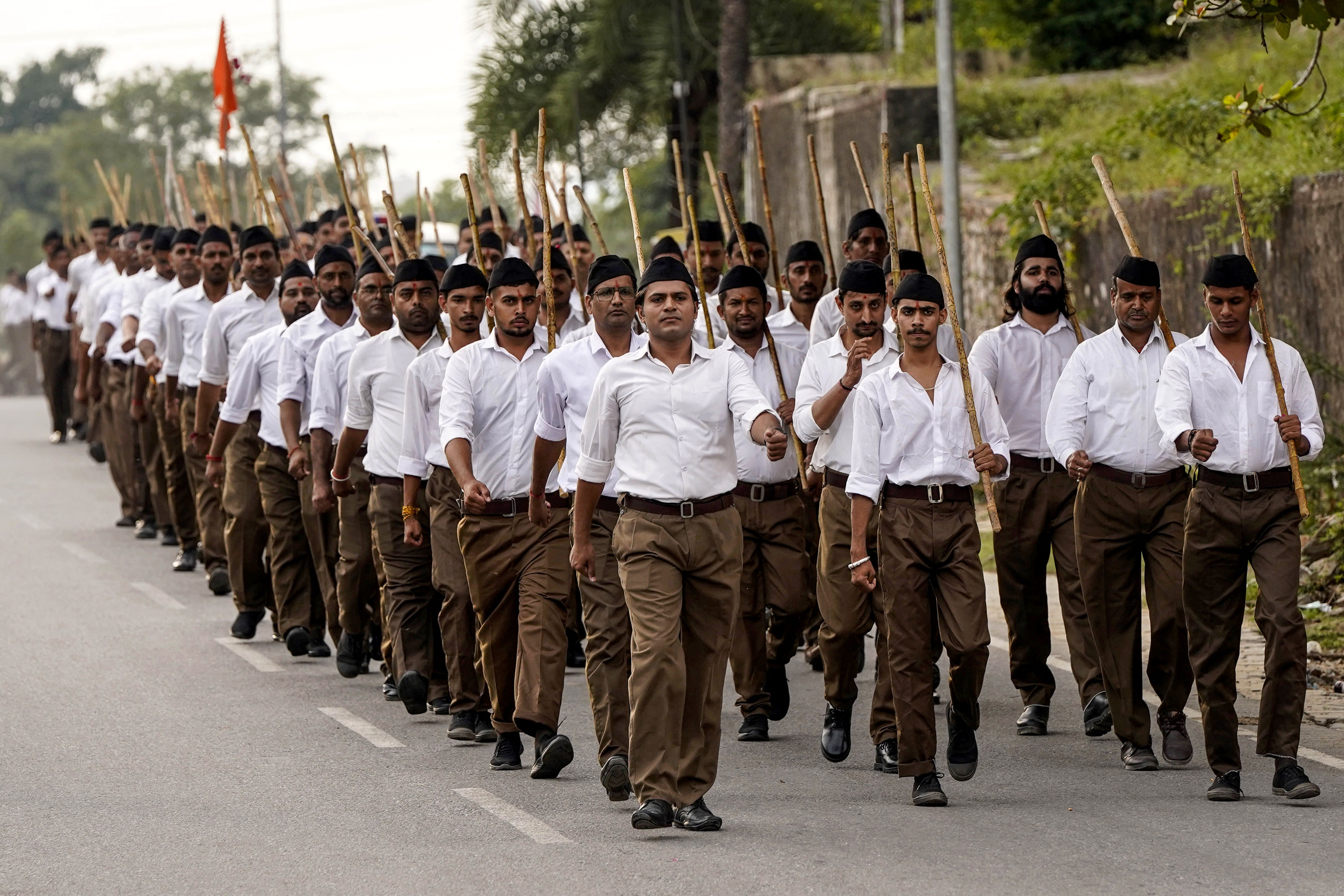 Members of the Rashtriya Swayamsevak Sangh (RSS) march in Pushkar on Sept. 16.