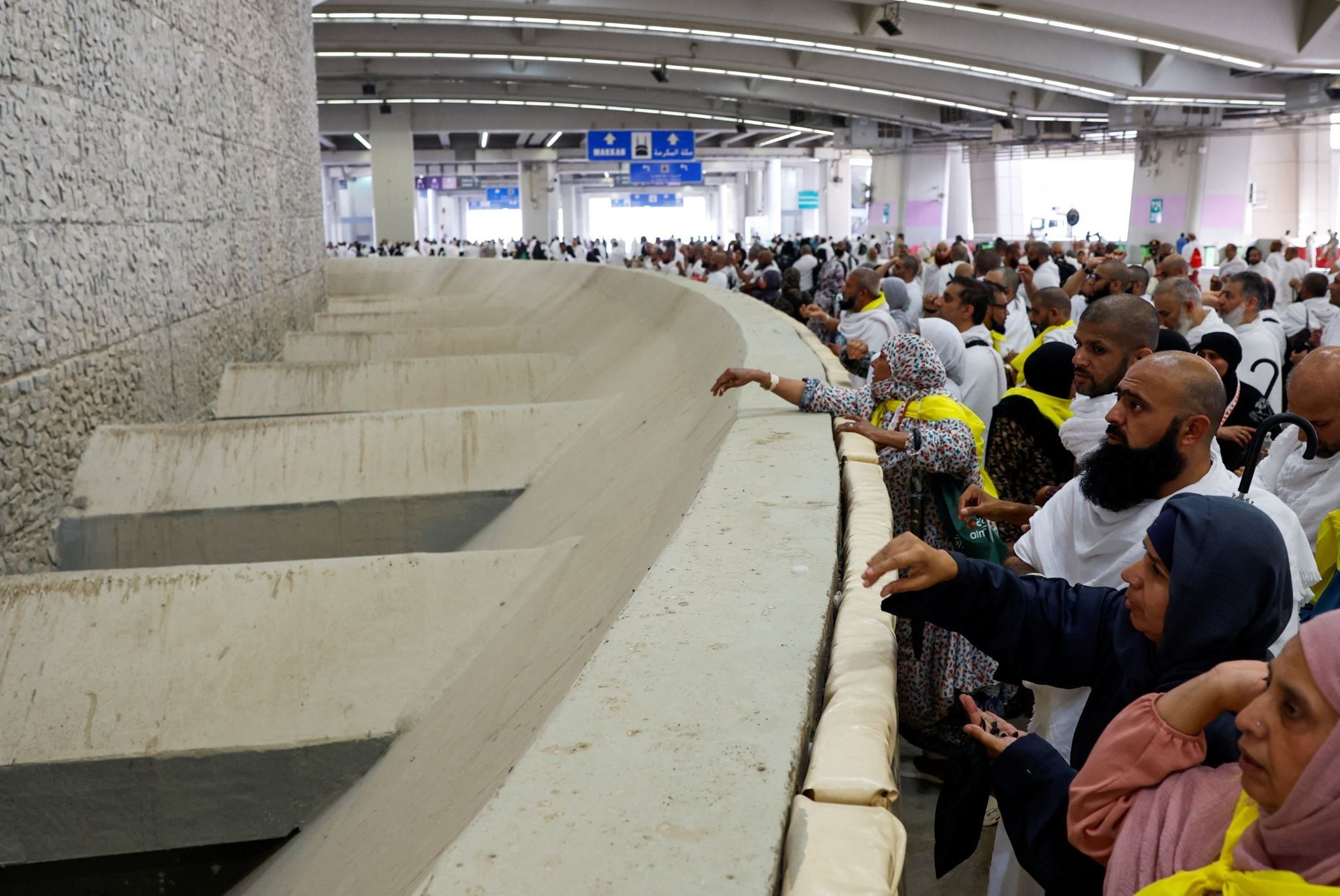 Muslim pilgrims hurl stones during ‘stoning of the devil’ ritual, in Mina