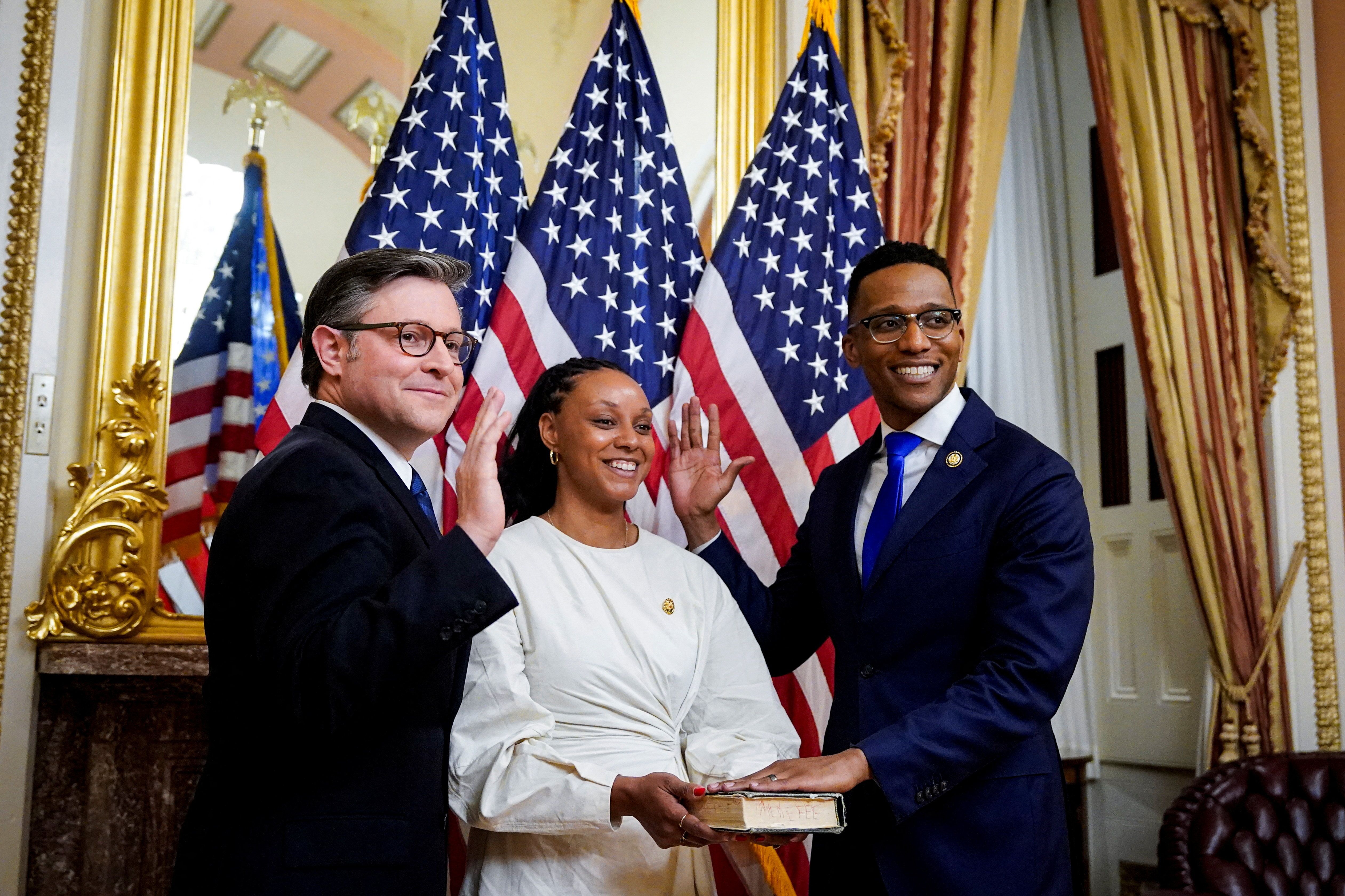 U.S. Representative Christian Menefee (D-TX) is ceremonially sworn-in by U.S. House Speaker Mike Johnson