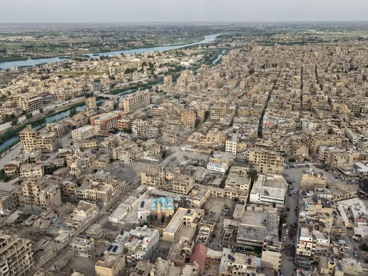 A drone view of Deir al-Zor city and the Euphrates River, Syria.