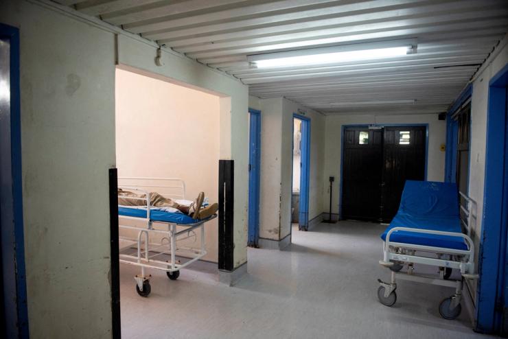A patient waits in the emergency room in Klerksdorp Tshepong public district hospital.