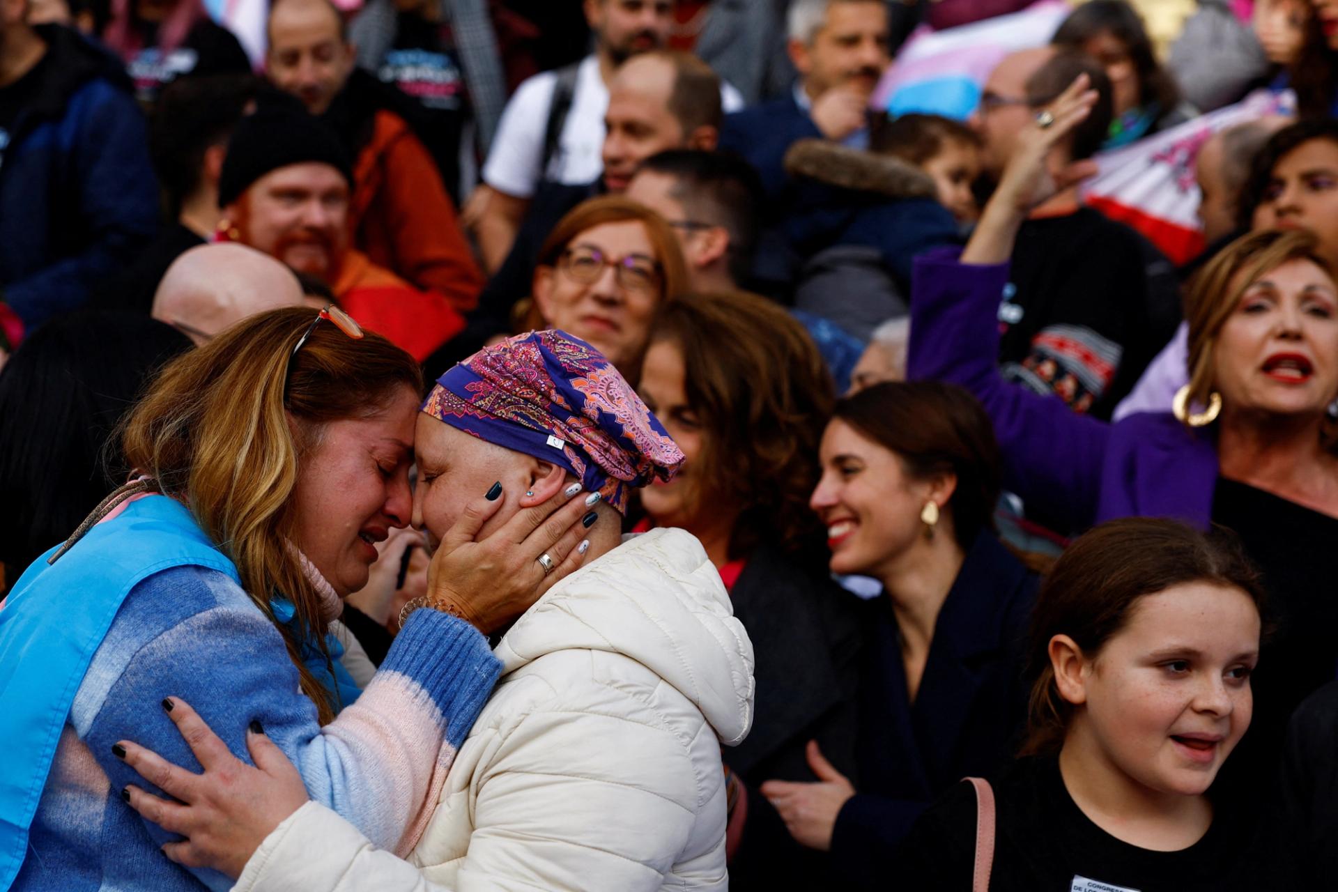 Activists celebrate transgender rights bill  outside Spain's Parliament in Madrid on Dec. 22