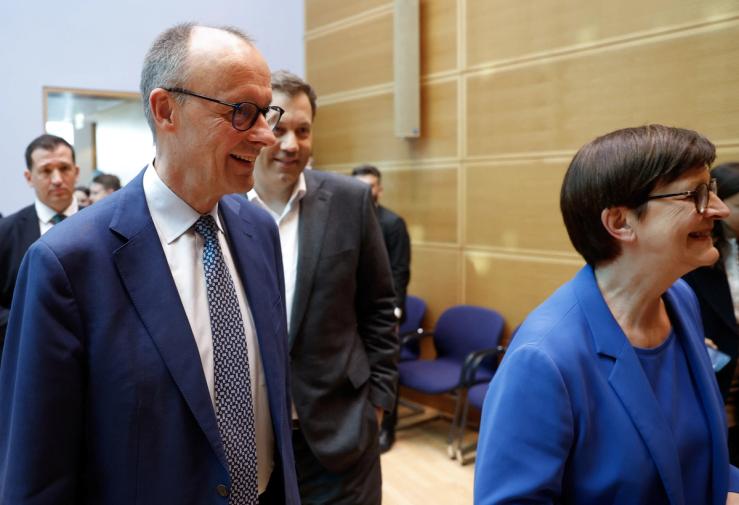 Chancellor-in-waiting Friedrich Merz and the co-leaders of the SPD party
