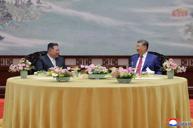 Kim and Xi.