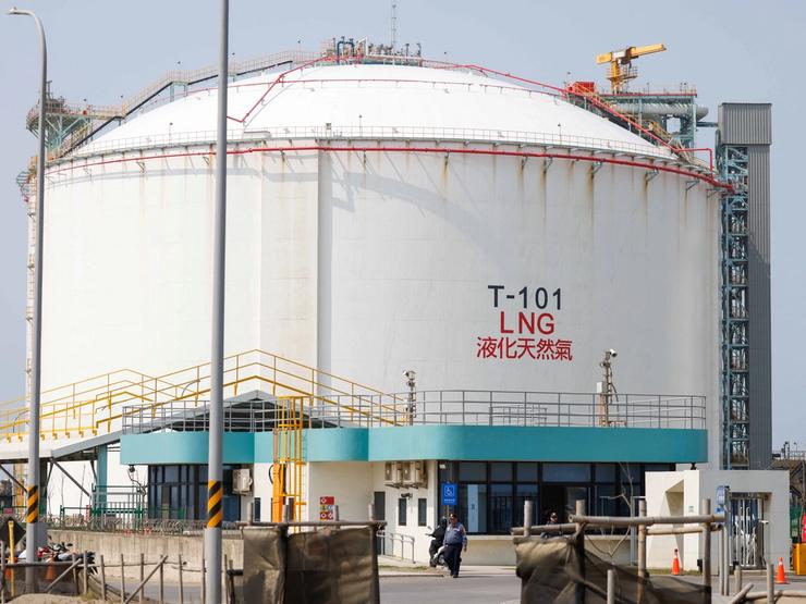 A security guard stands at the entrance of Guan-Tang LNG Receiving Terminal in Taiwan.