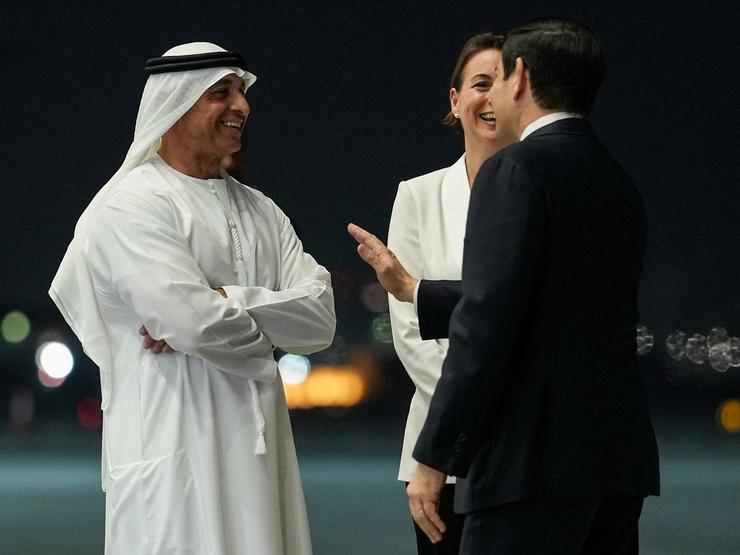 U.S. Secretary of State Marco Rubio speaks with UAE Ambassador to the U.S. Yousef Al Otaiba upon his arrival at Al Bateen Executive Airport.