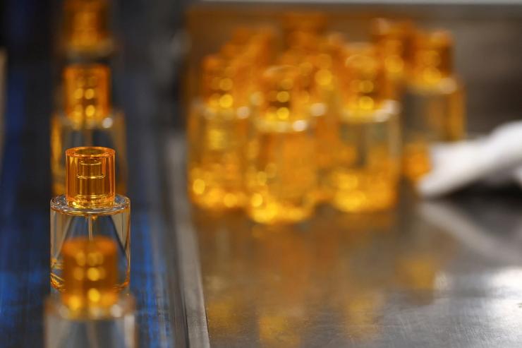 Bottles of Solinotes perfume are seen along the production line at scent maker Corania factory.