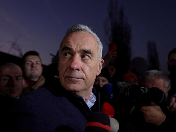 Romanian presidential candidate Calin Georgescu makes statements to the press in Izvorani, Ilfov county, near Bucharest, Romania