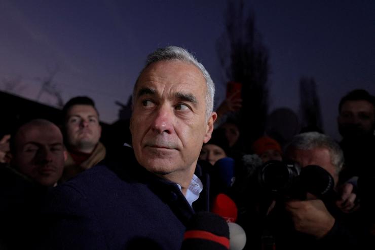 Romanian presidential candidate Calin Georgescu makes statements to the press in Izvorani, Ilfov county, near Bucharest, Romania