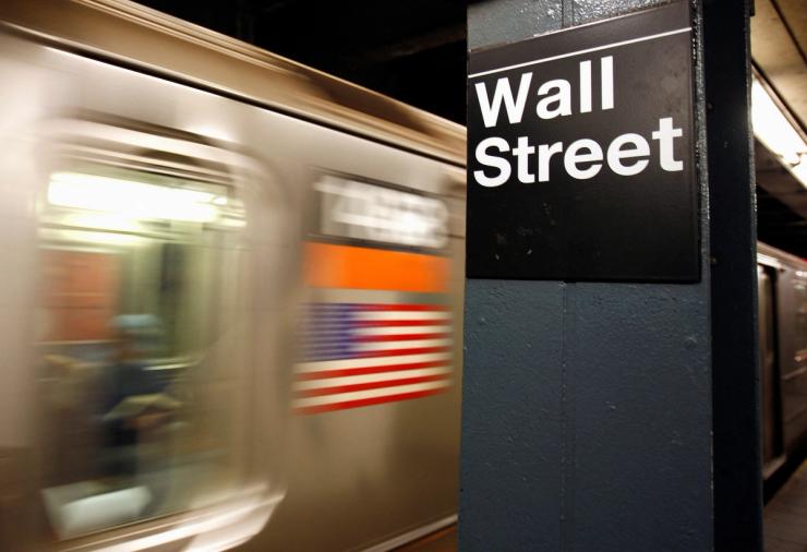 A Wall Street subway stop sign is seen in New York.