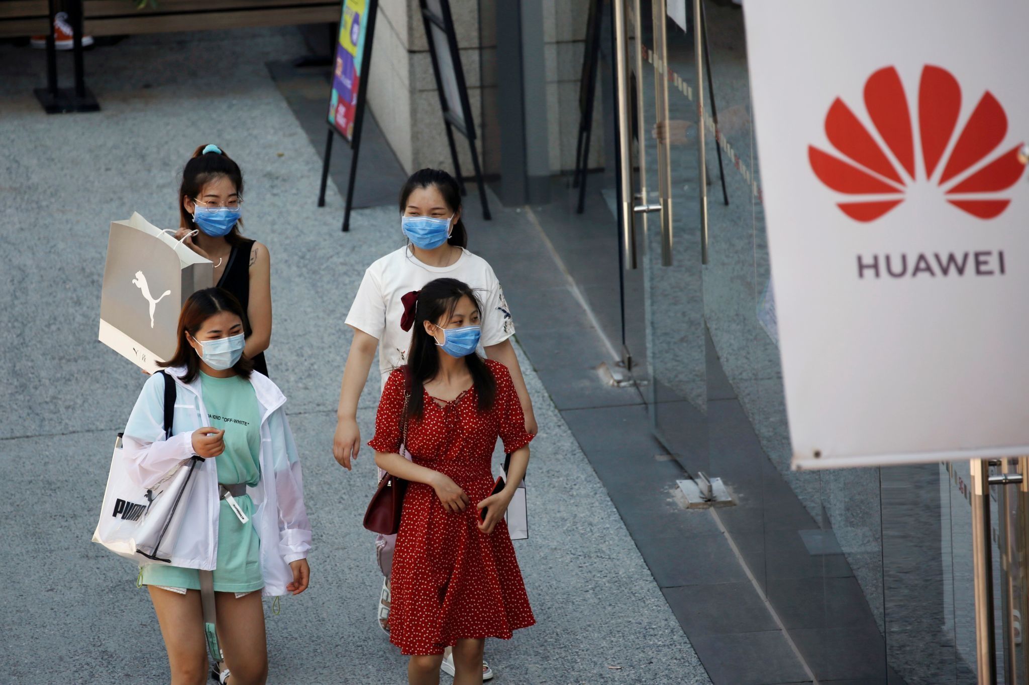 Women wearing face masks in Beijing. 
