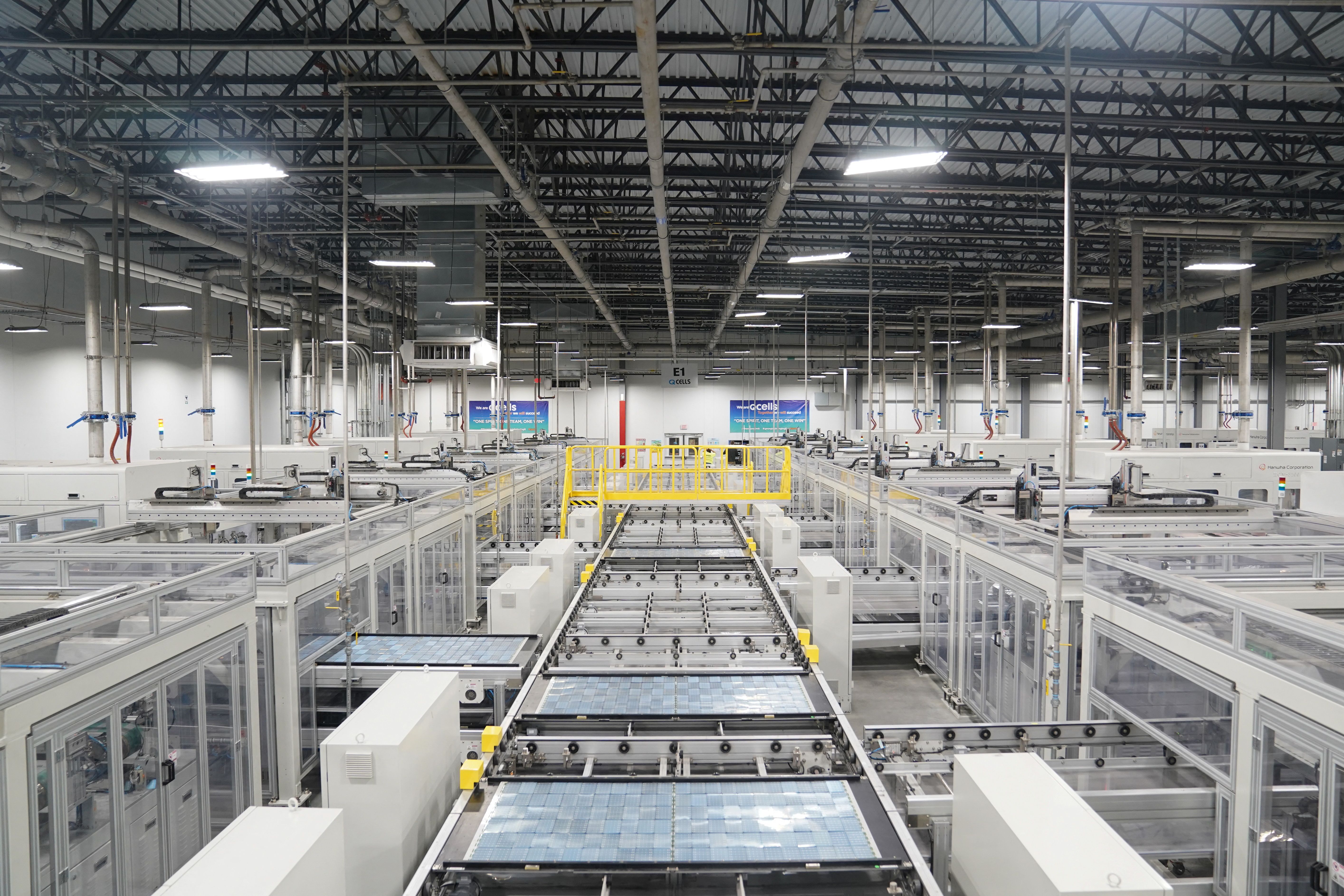 Solar panels are built in a factory.