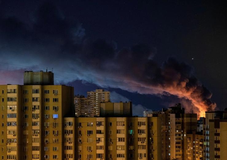 Smoke rises from Kyiv following a Russian attack.