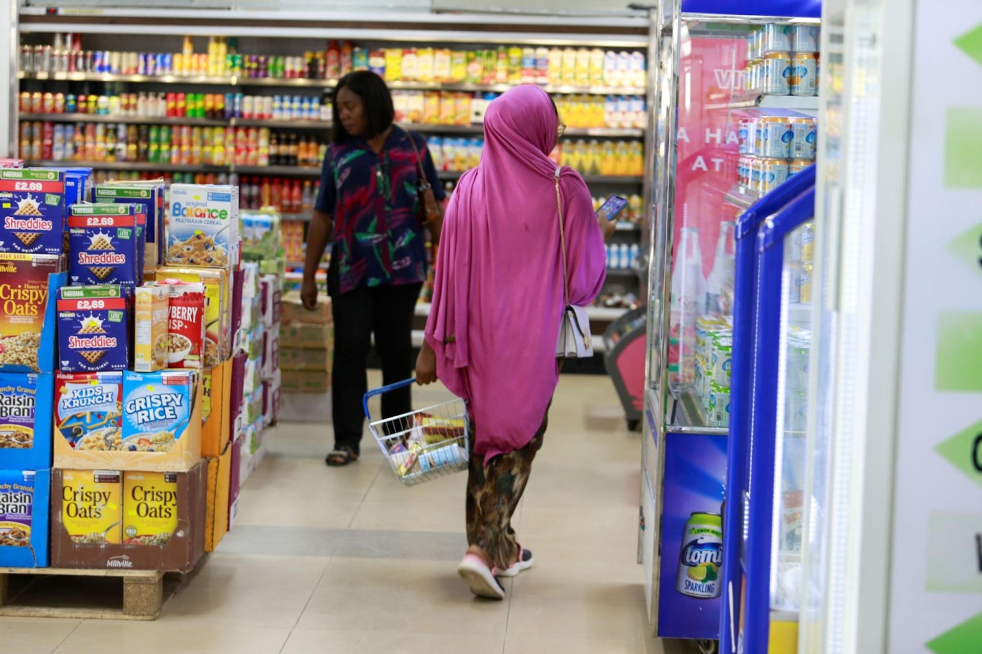 Two people in a shop