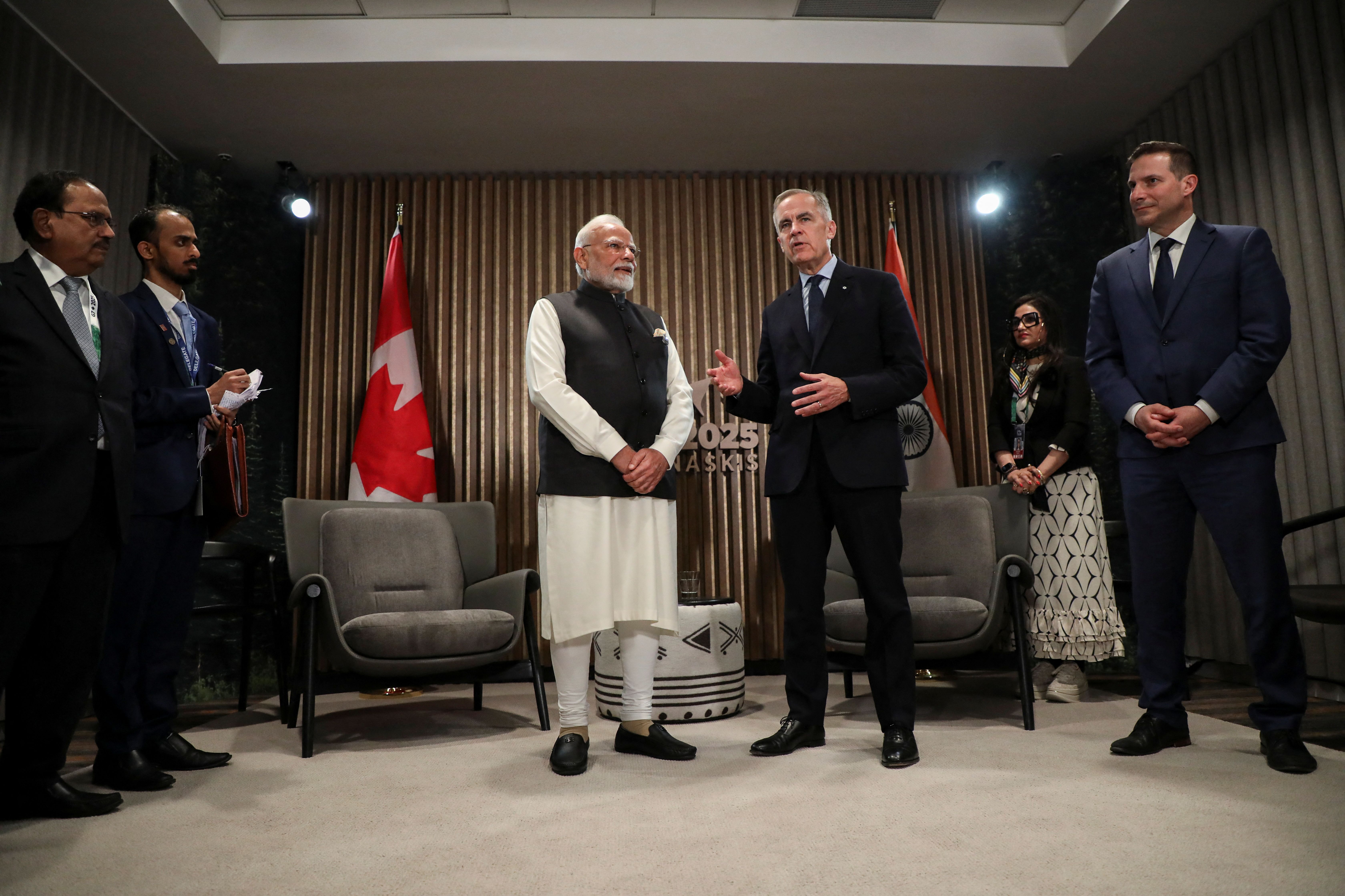 Indian Prime Minister Narendra Modi and Canadian Prime Minister Mark Carney