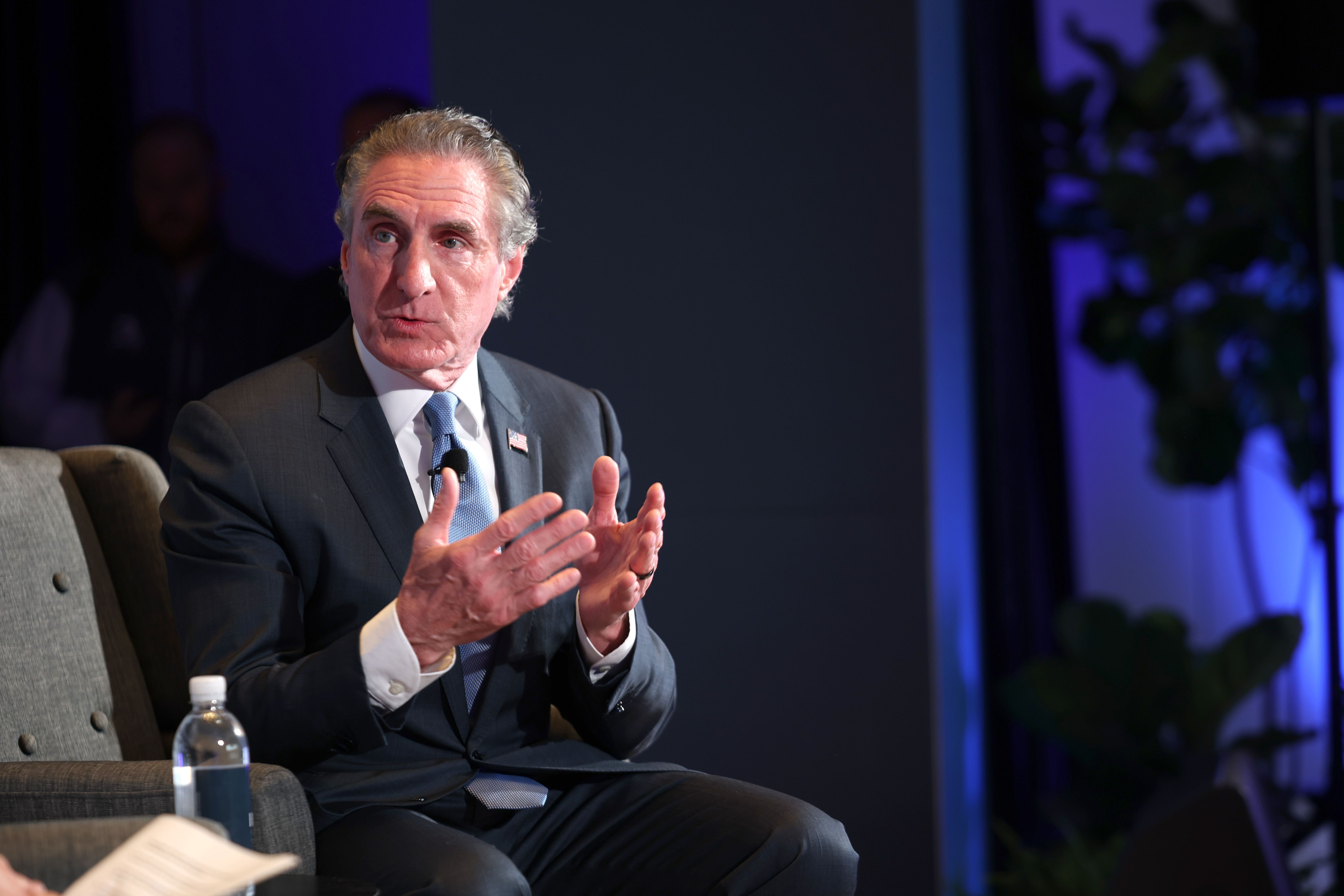 Doug Burgum on stage. 