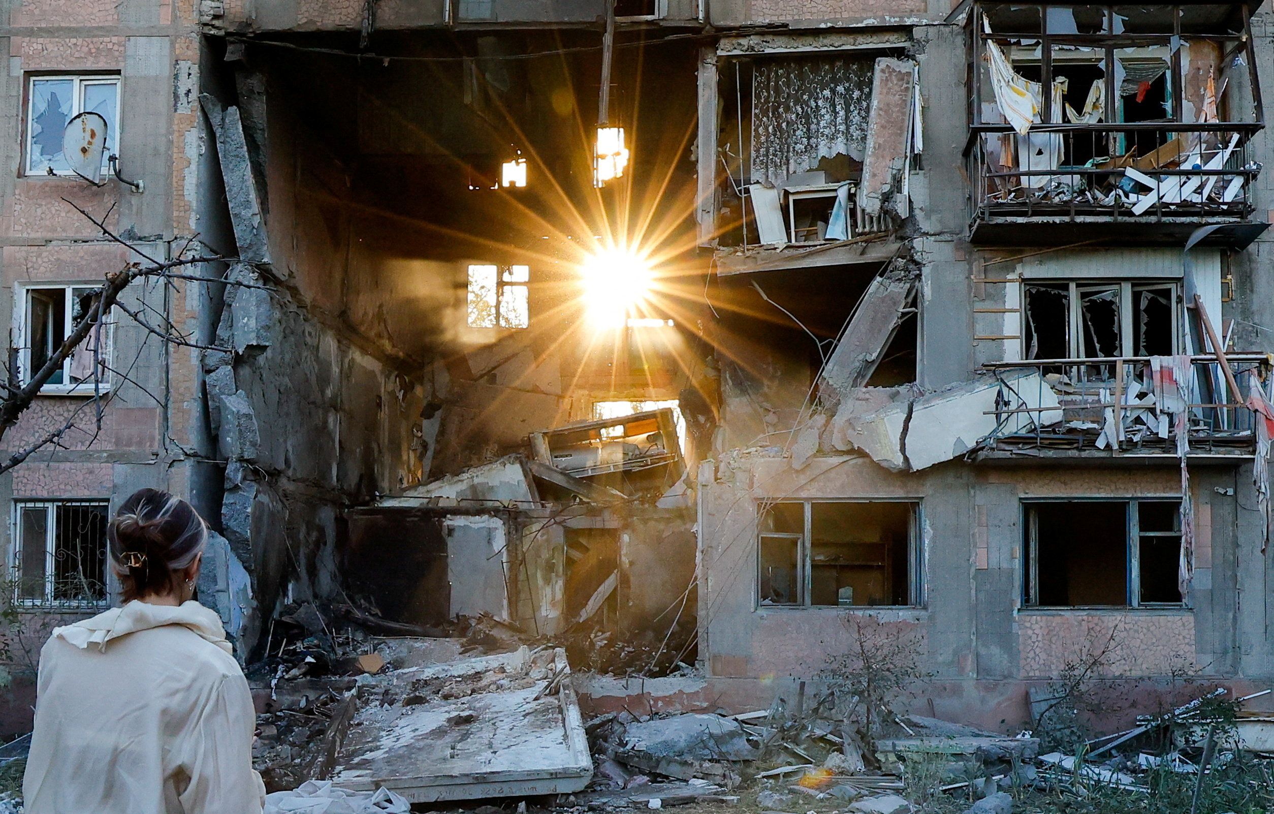 a heavily damaged multi-storey residential building following an overnight attack.