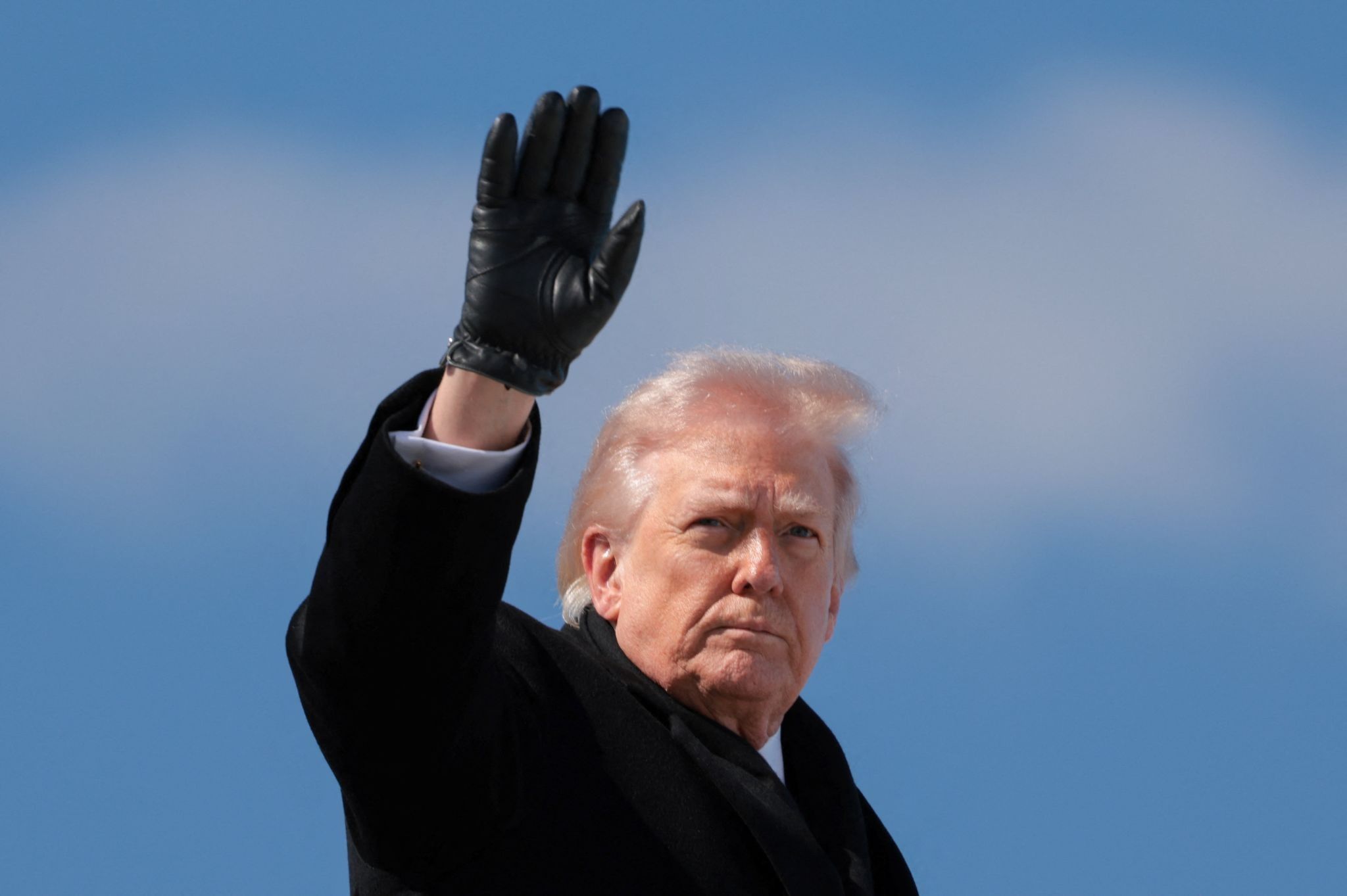 US President Donald Trump waves