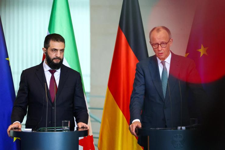 German Chancellor Friedrich Merz and Syrian President Ahmed al-Sharaa hold a press conference at the Chancellery, in Berlin.