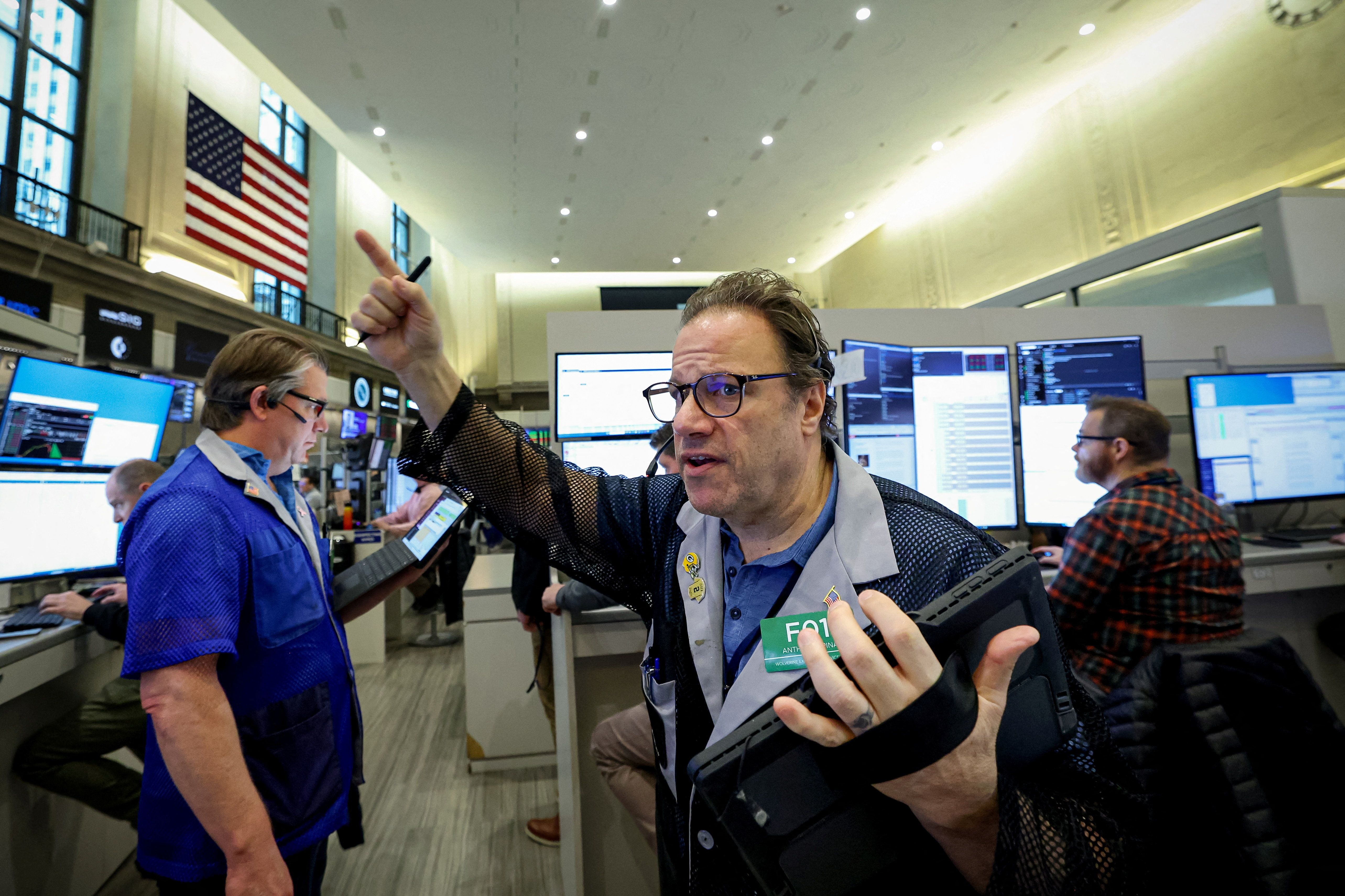 Traders on the floor of the New York Stock Exchange