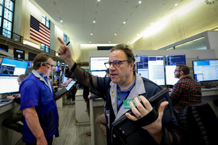 Traders on the floor of the New York Stock Exchange