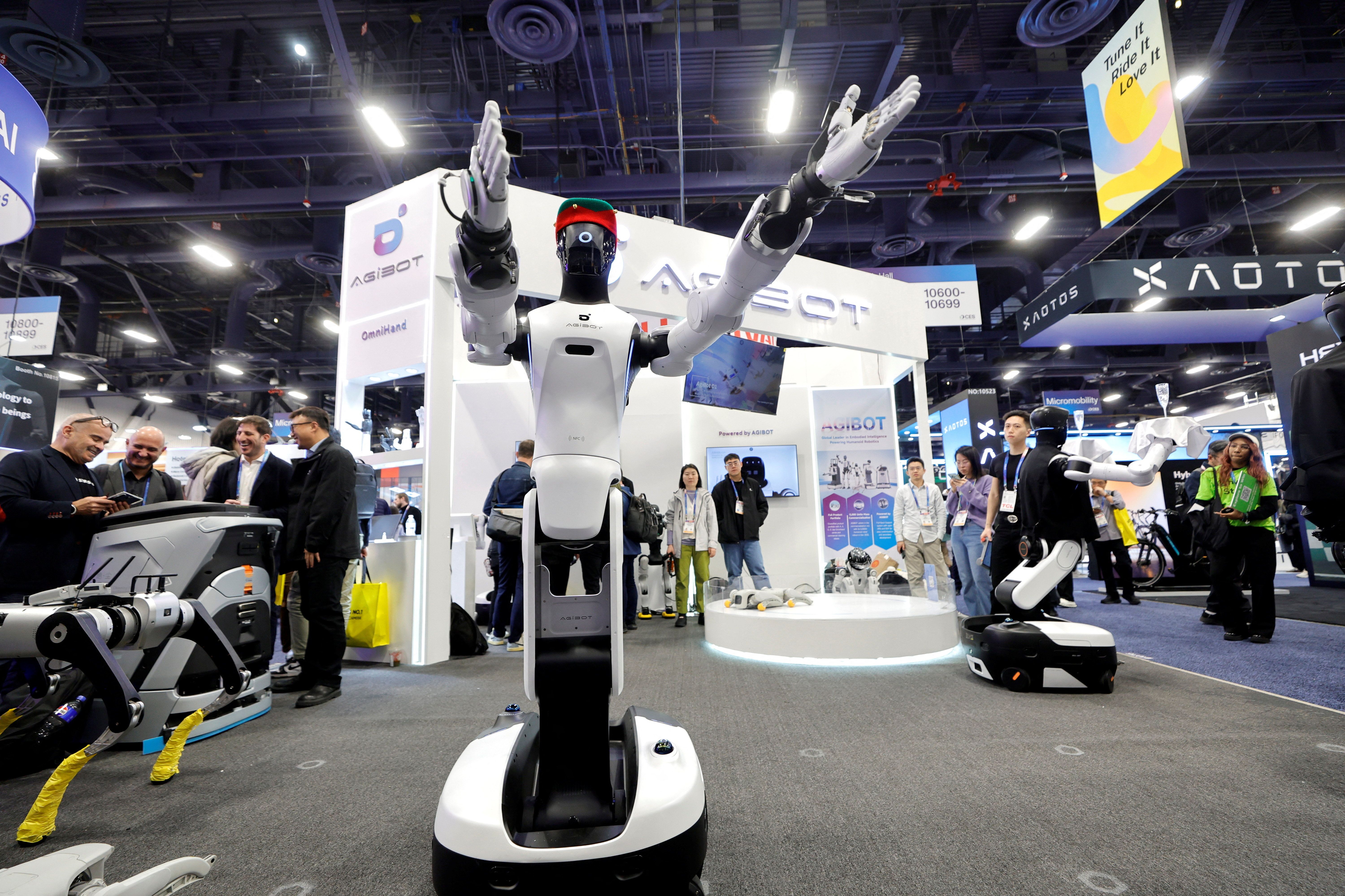 An AgiBot robot “dances” to music during CES 2026, an annual consumer electronics trade show.