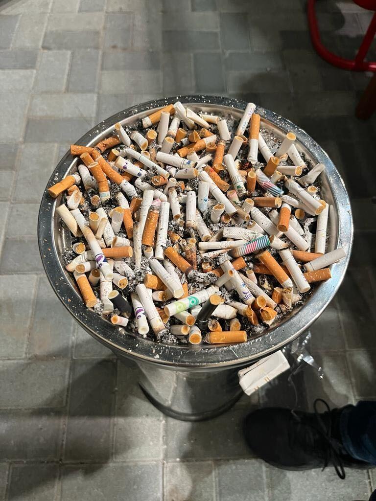 An ashtray full of cigarettes.