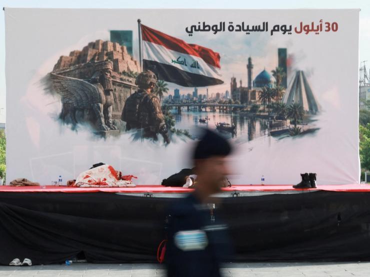 A banner in Baghdad marking the withdrawal of US troops